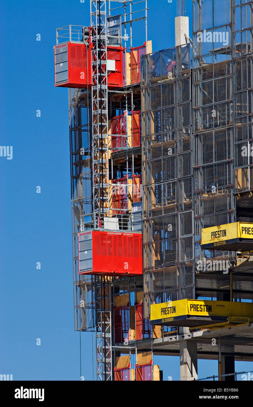 Construction / A Passenger Hoist climbs a Building Project.Melbourne