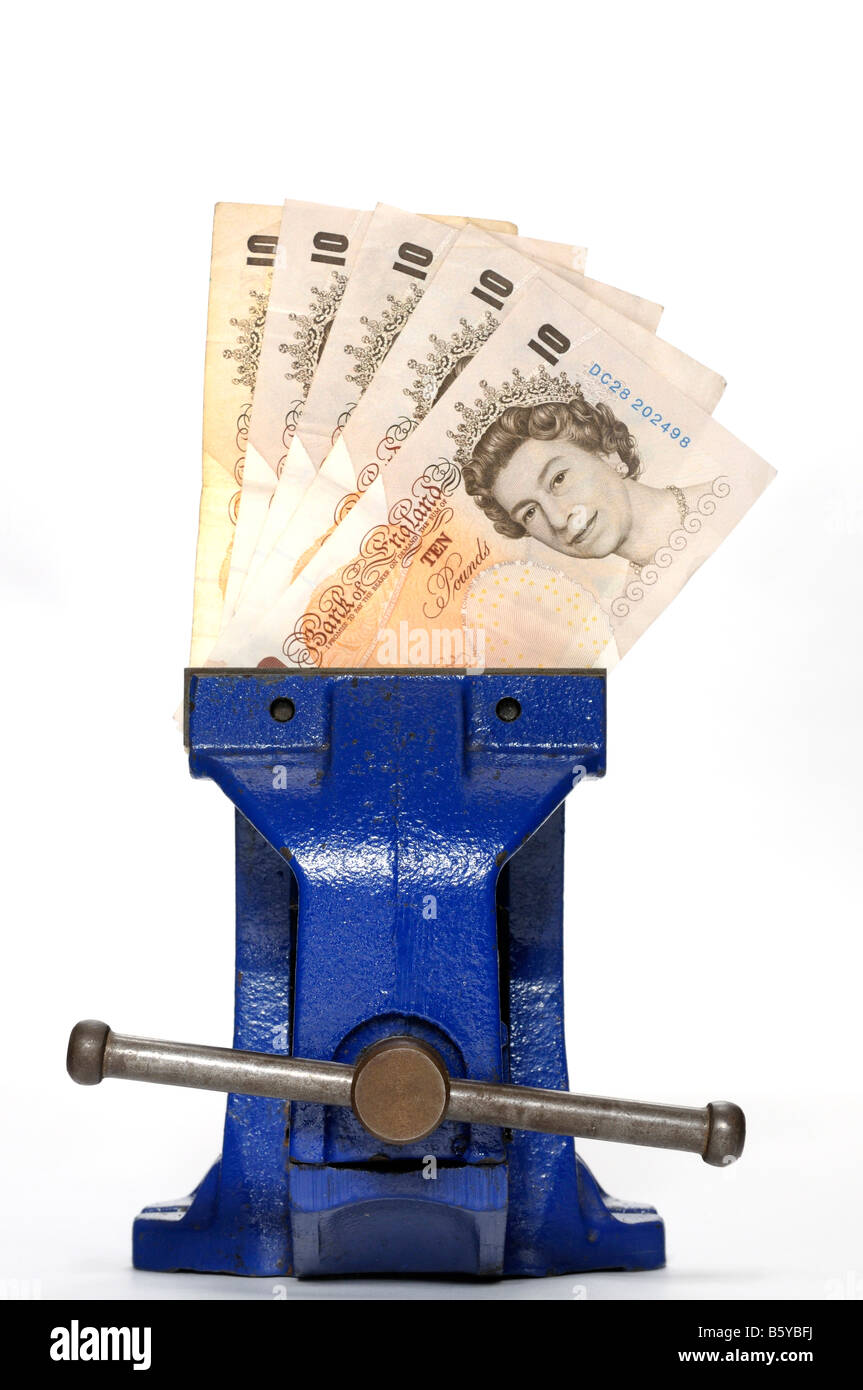 Money clamped in a vice Stock Photo Alamy