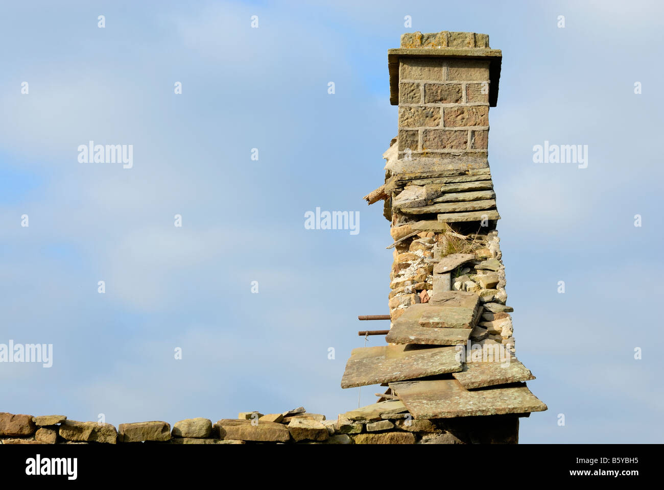Gable end and chimney stack on a derelict farmhouse Stock Photo
