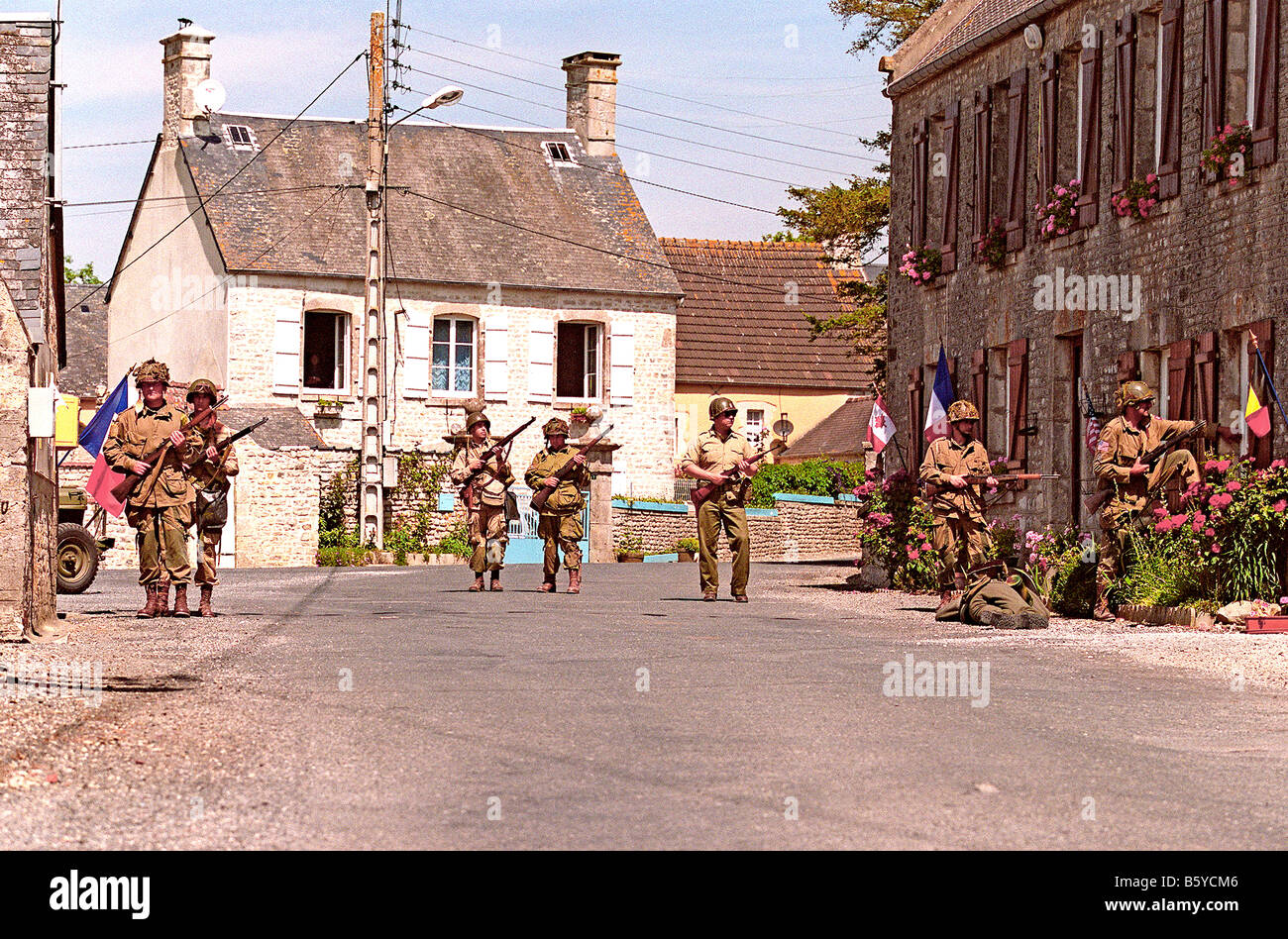 D Day re enactment U.S. 101st  airborne paratroopers liberation of village of Houesville Normandy France on the 8th June 1944 Stock Photo