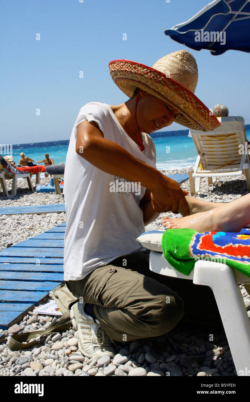 Masseur beach hi-res stock photography and images - Alamy