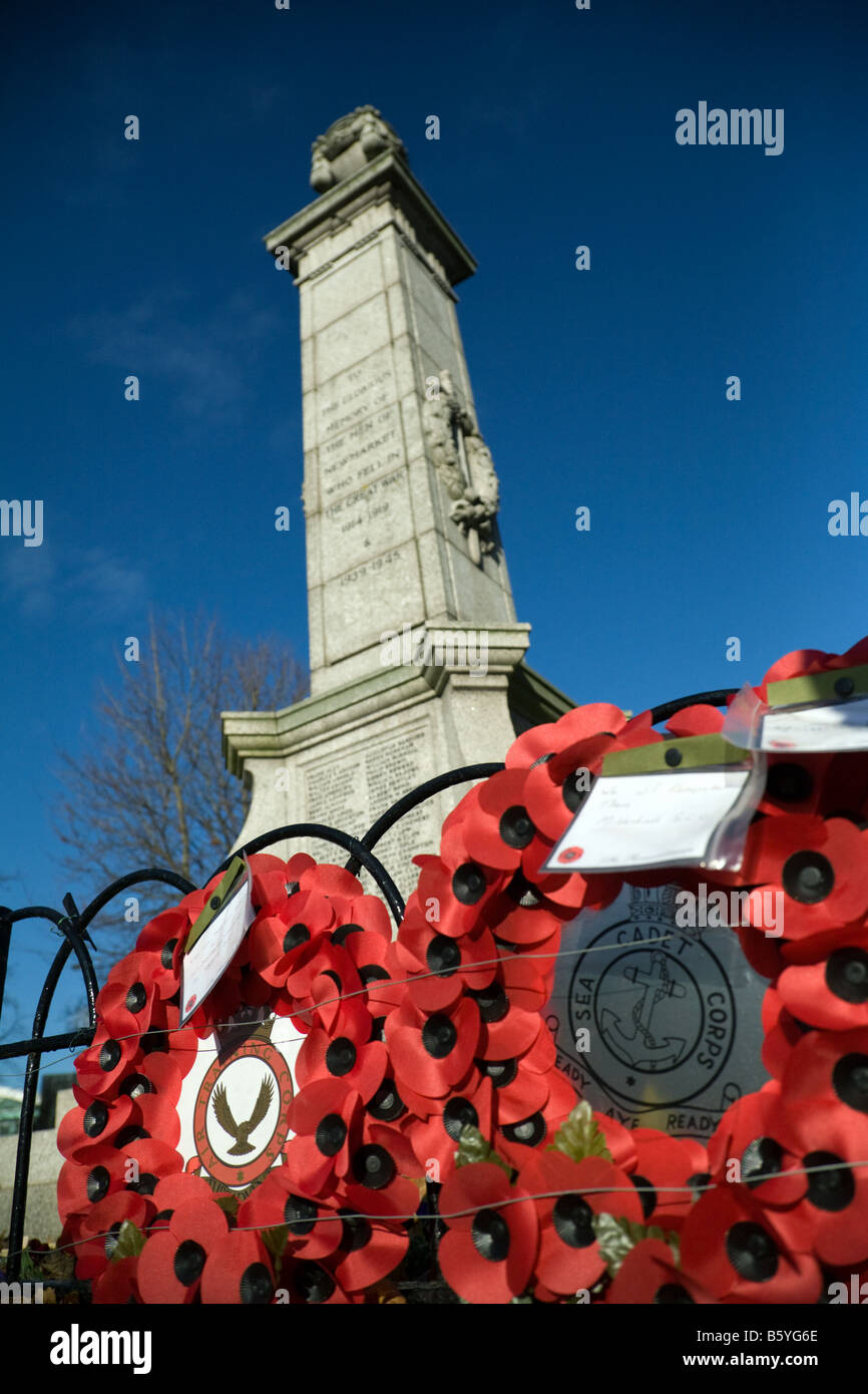Poppy wreaths around the base of the War Memorial, Newmarket Suffolk UK Stock Photo