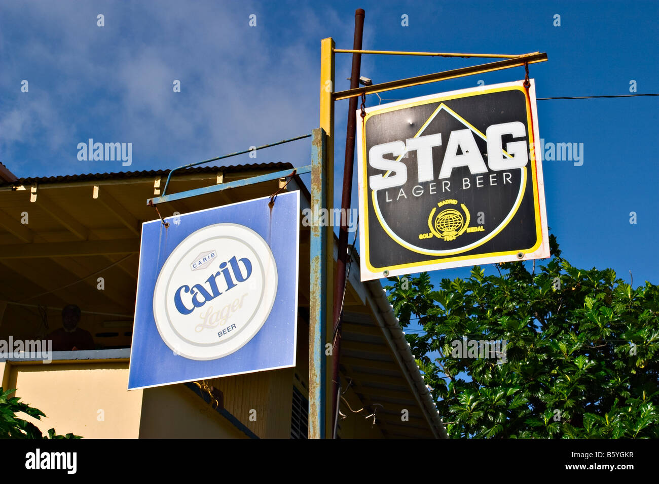 Carib and Stag beer signs, Trinidad, Trinidad & Tobago, Caribbean Stock Photo Alamy