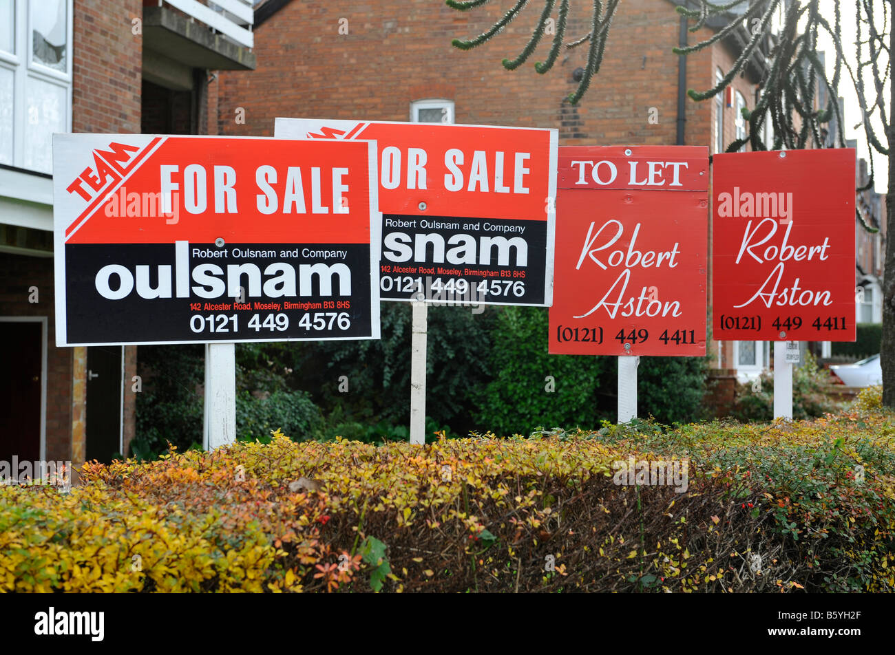 A group of house for sale signs in Birmingham West Midlands England UK