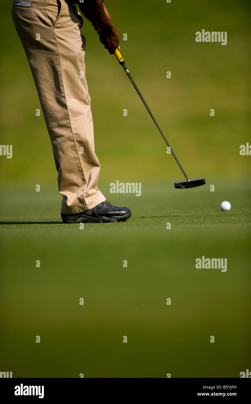 A golfer during the final round of the 2008 Omega World Cup of Golf at the Mission Hills Golf Club in Shenzhen China Stock Photo