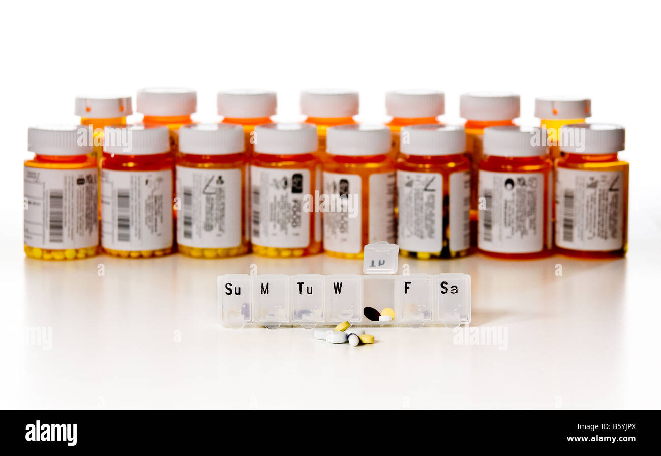 Horizontal row of prescription drug bottles Stock Photo