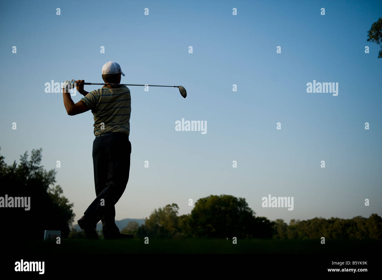 A golfer during the final round of the 2008 Omega World Cup of Golf at the Mission Hills Golf Club in Shenzhen, China Stock Photo
