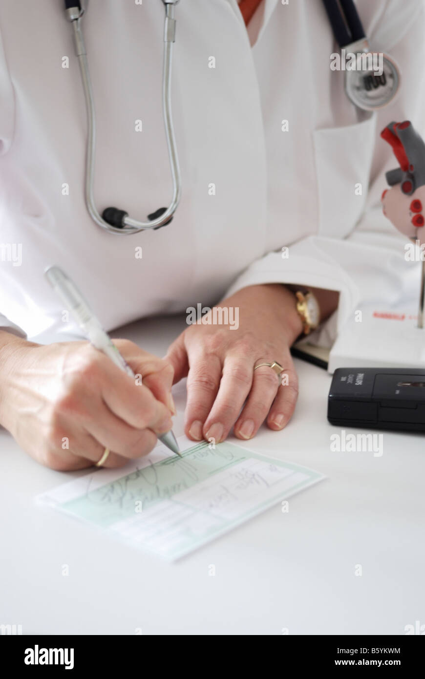 Doctor writes a prescription-close-up Stock Photo