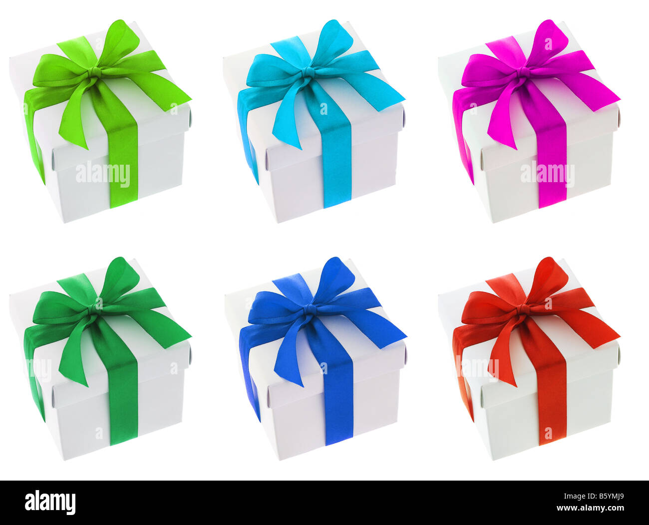 White gift boxes with different color bow ribbons arranged on white background Stock Photo