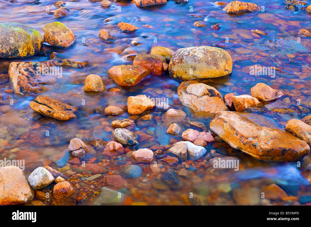 Pebbles and stones in the the river etive Stock Photo