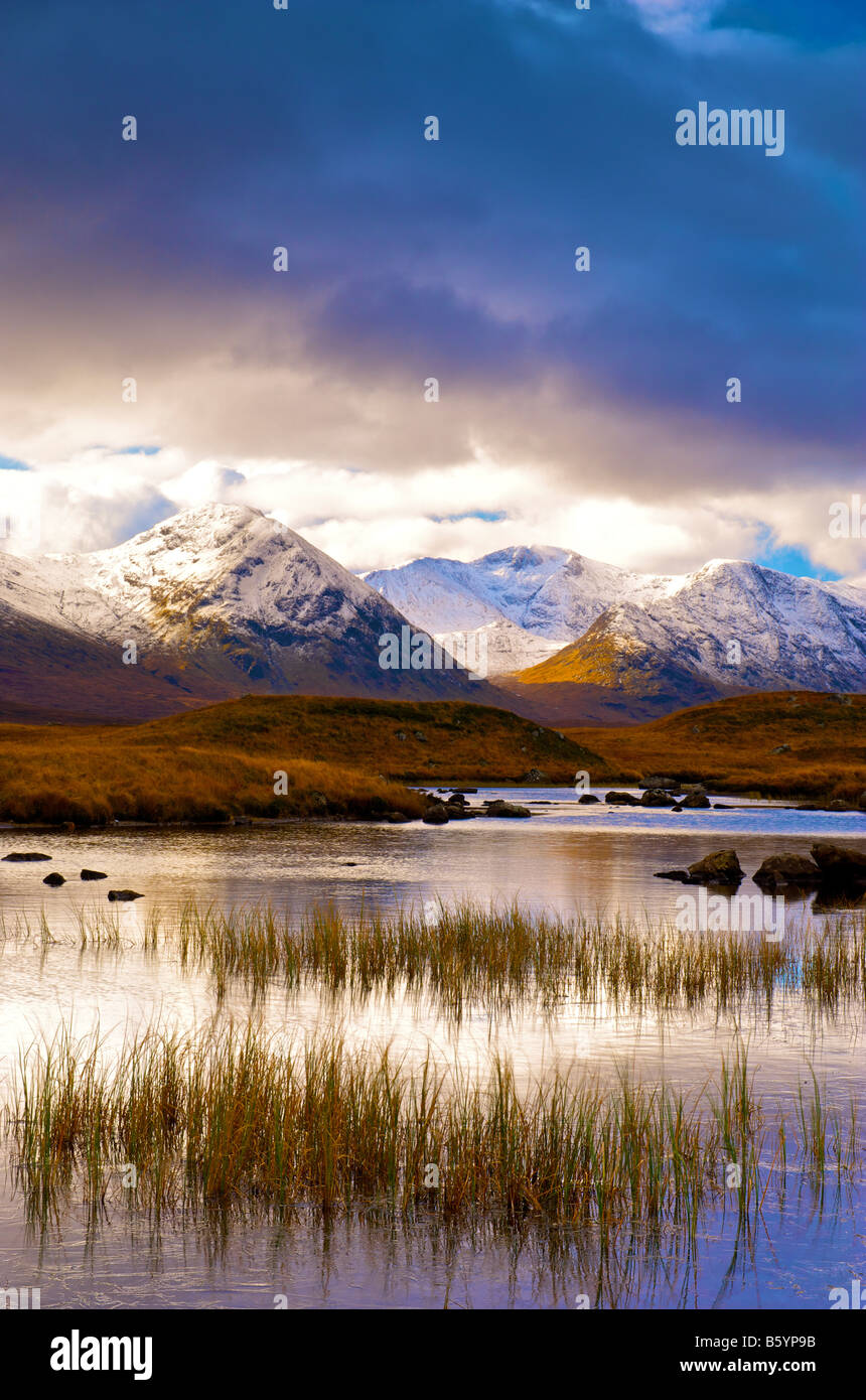 Black Mount at dawn reflected in ice covered river Rannoch Moor Scottish Highlands Stock Photo