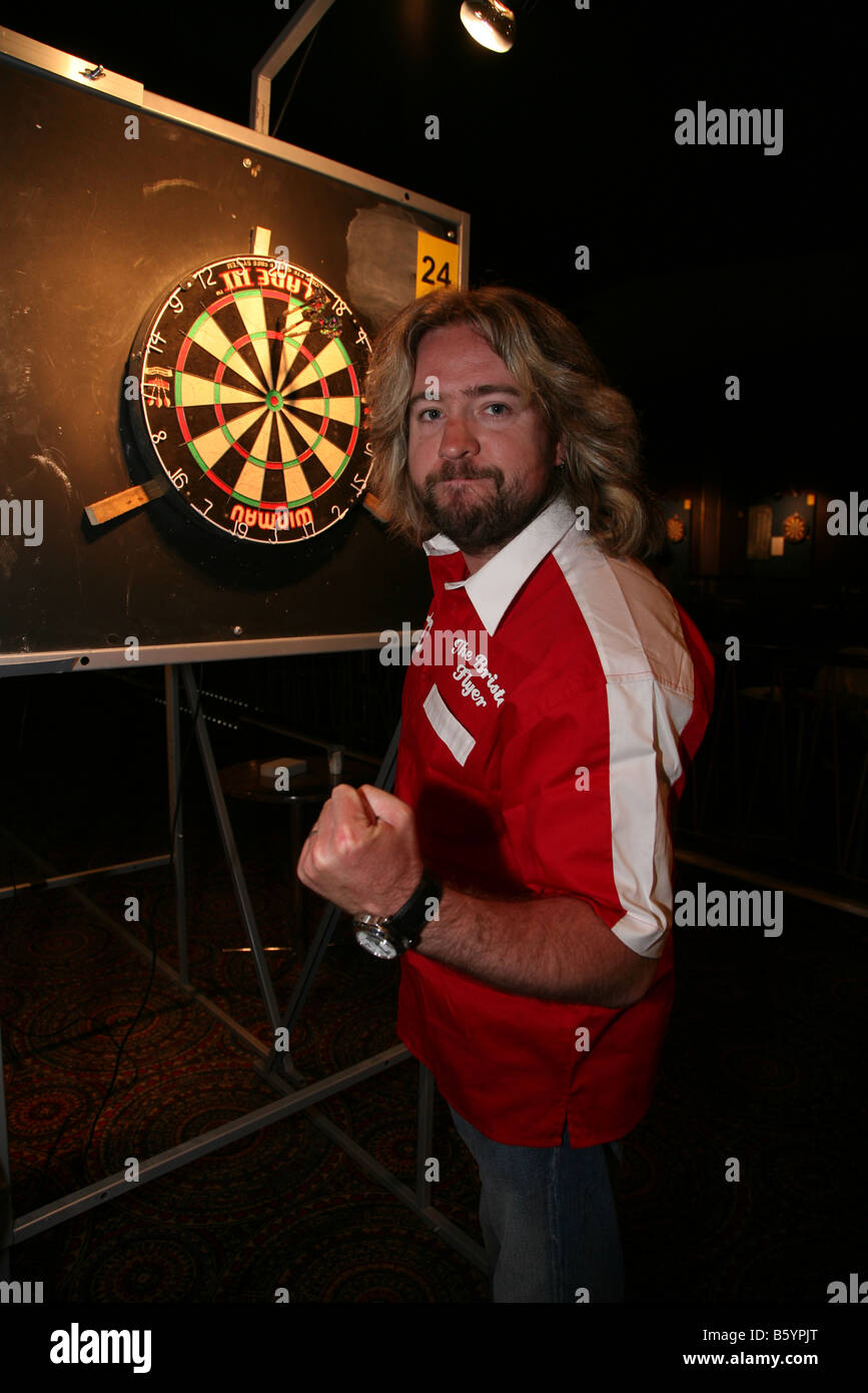 darts playing drinking pint man competition justin lee collins throwing
