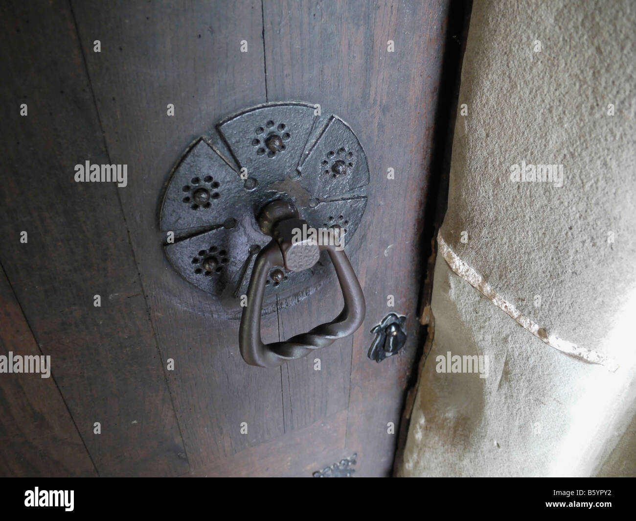 old gate with handles and lock Stock Photo