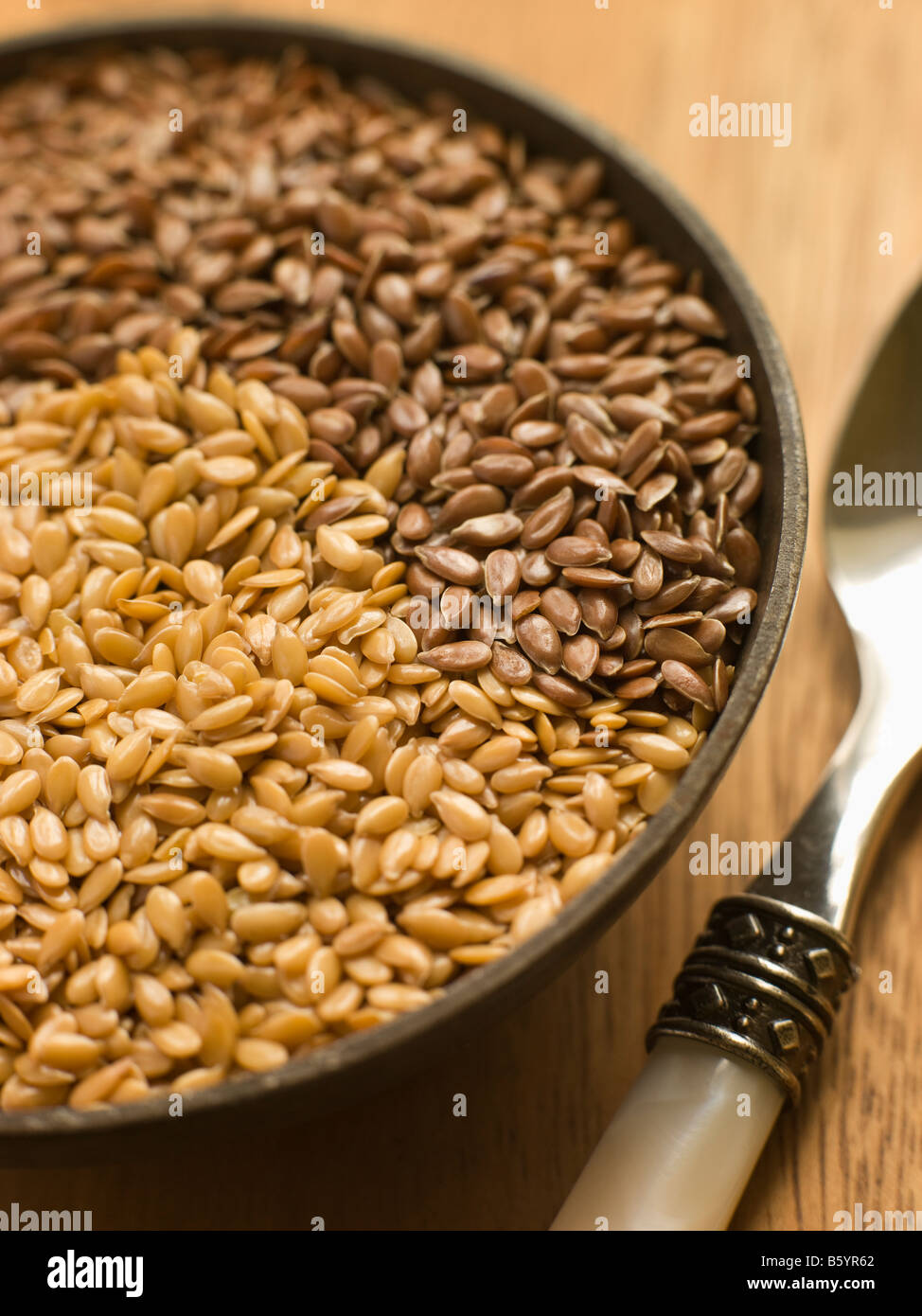 Dish of Golden and Brown Linseed Stock Photo Alamy