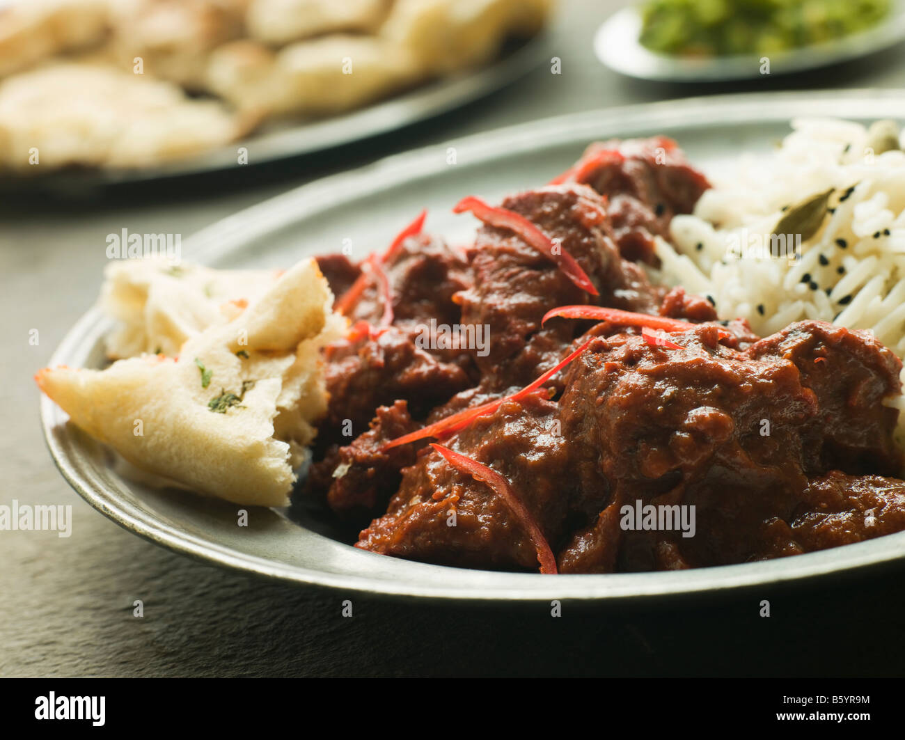 Pewter Plate With Meat Phall Fragrant Basmati and Naan Stock Photo