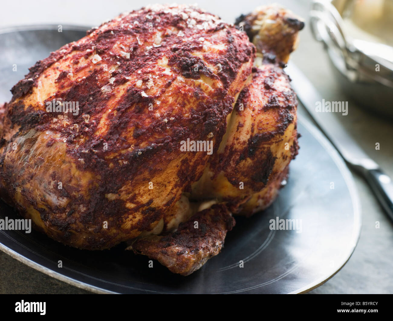 Roast Tandoori Chicken stuffed with Keema Stock Photo