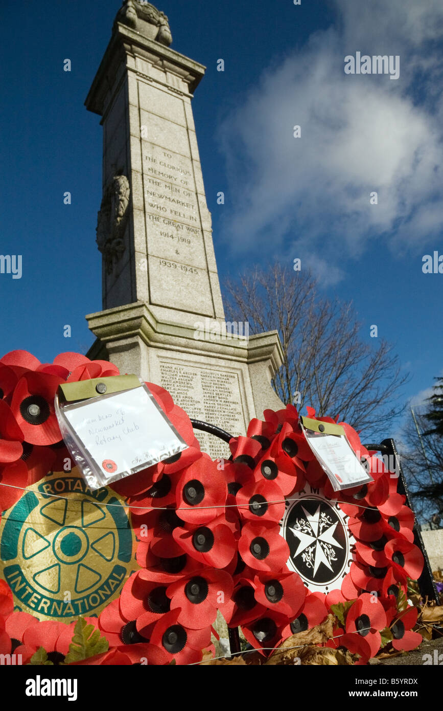 Poppy wreaths at the base of the War memorial, Newmarket Suffolk, UK Stock Photo