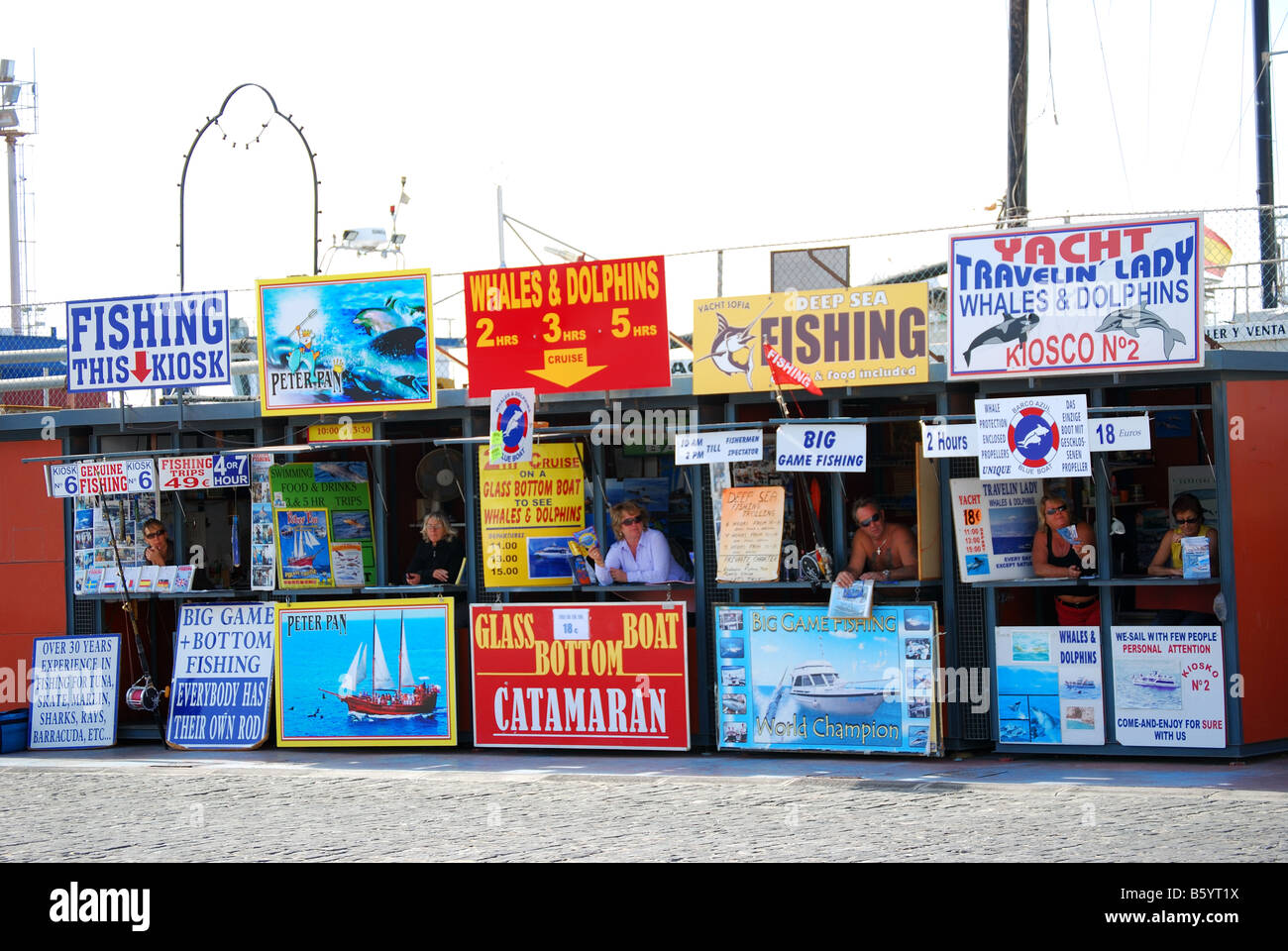 Fishing and sightseeing excursion booths by harbour, Los Cristianos
