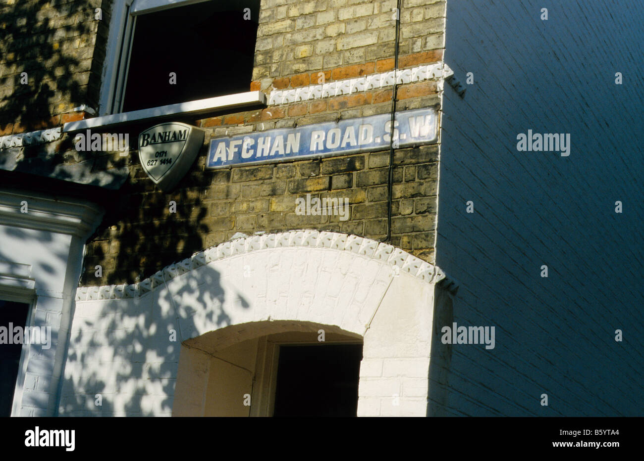 Afghan road on street sign on house near clapham junction hires stock