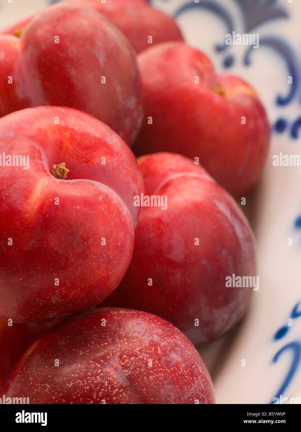 Plums In Dish Stock Photo