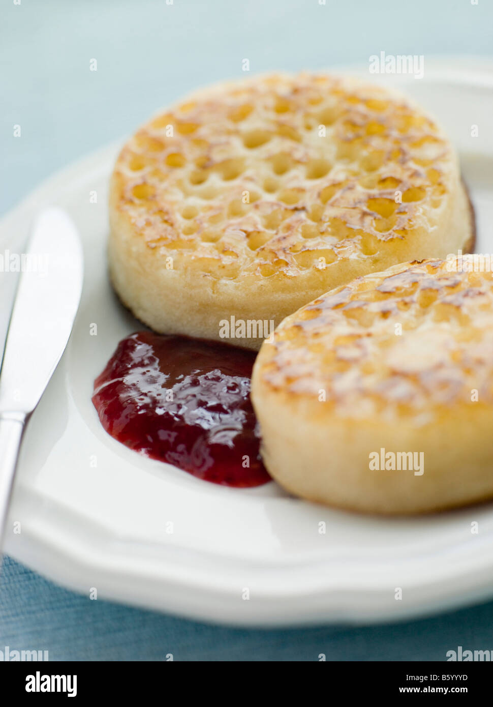 Crumpets with Butter and Jam Stock Photo