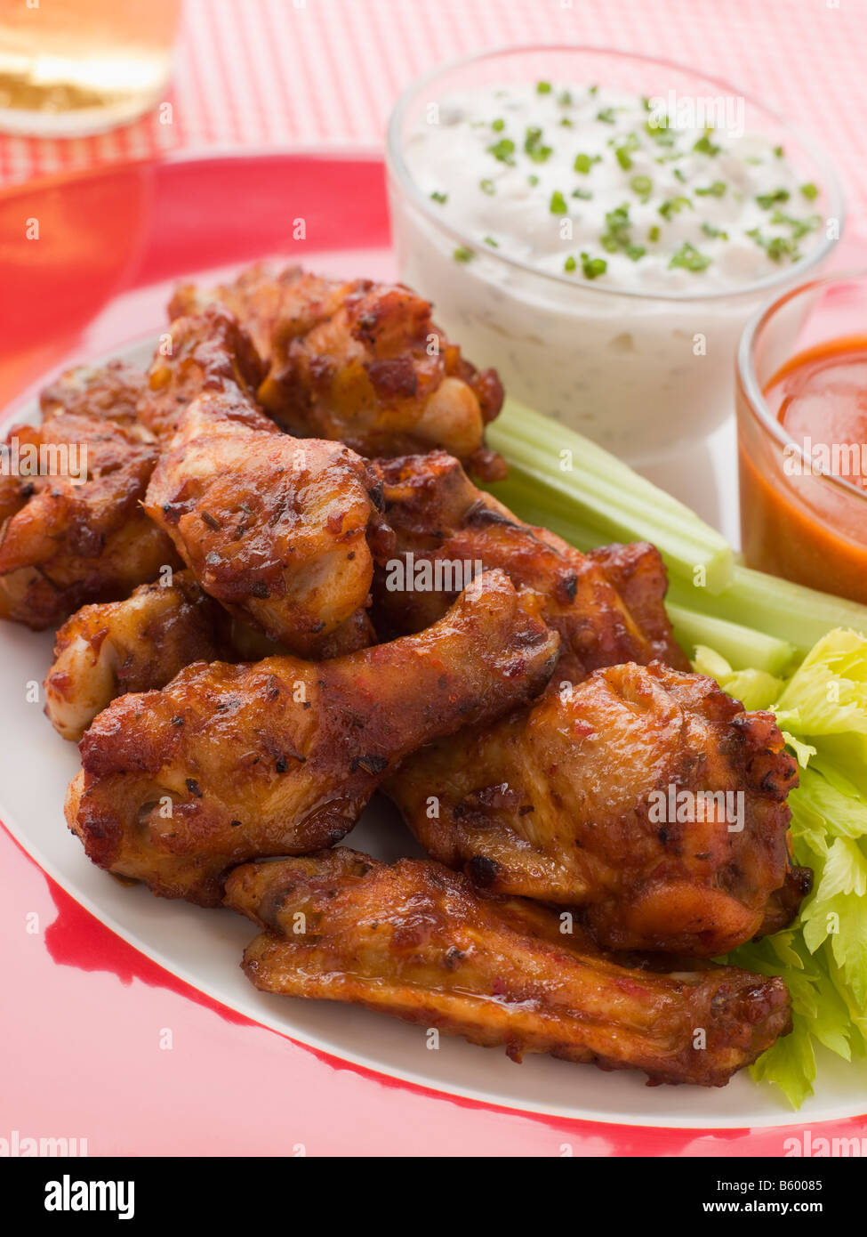 Spicy Buffalo Wings with Blue Cheese Dip Celery and Hot Chilli Sauce
