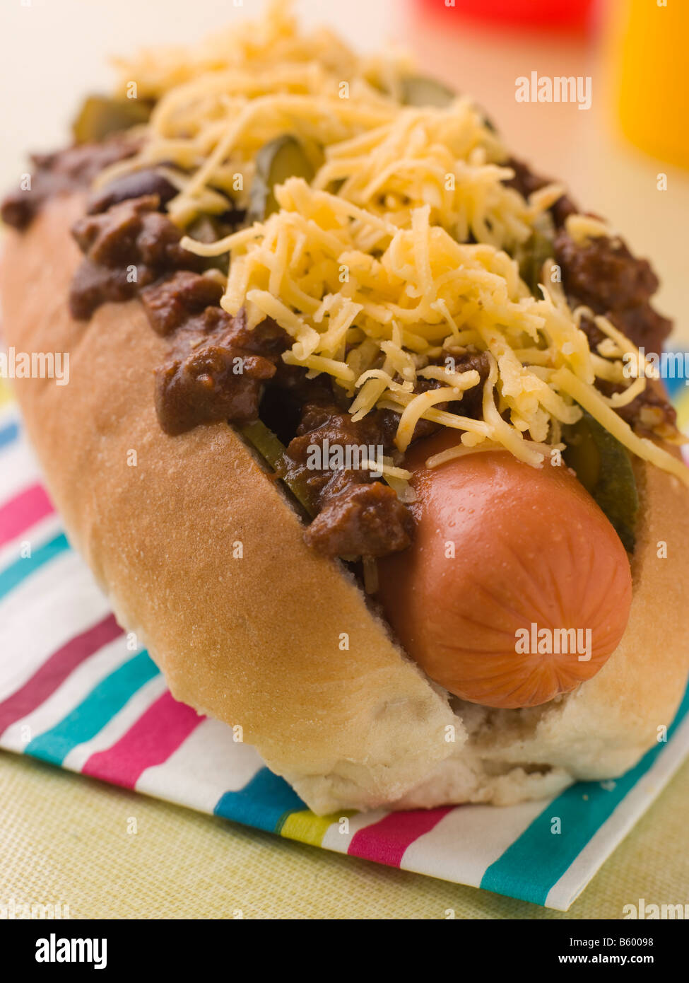 Chilli Dog in a Napkin Stock Photo