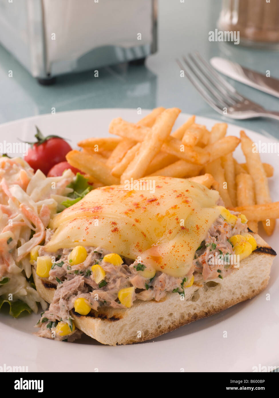 Open Tuna and Sweet corn Melt with Coleslaw and Fries Stock Photo