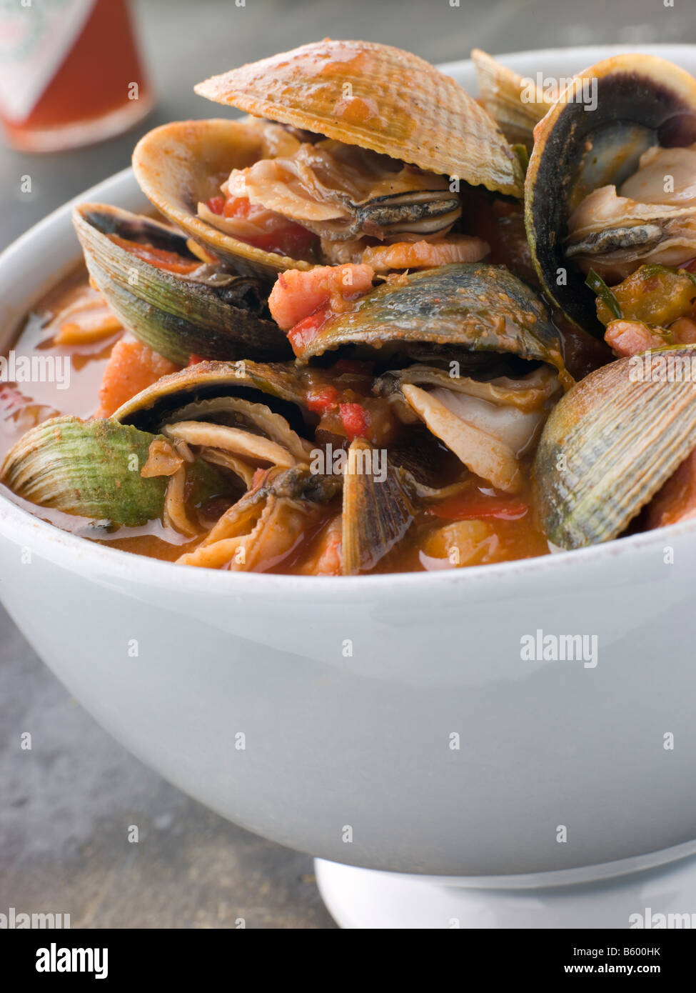 Bowl of Manhattan Clams with Hot Chilli Sauce Stock Photo