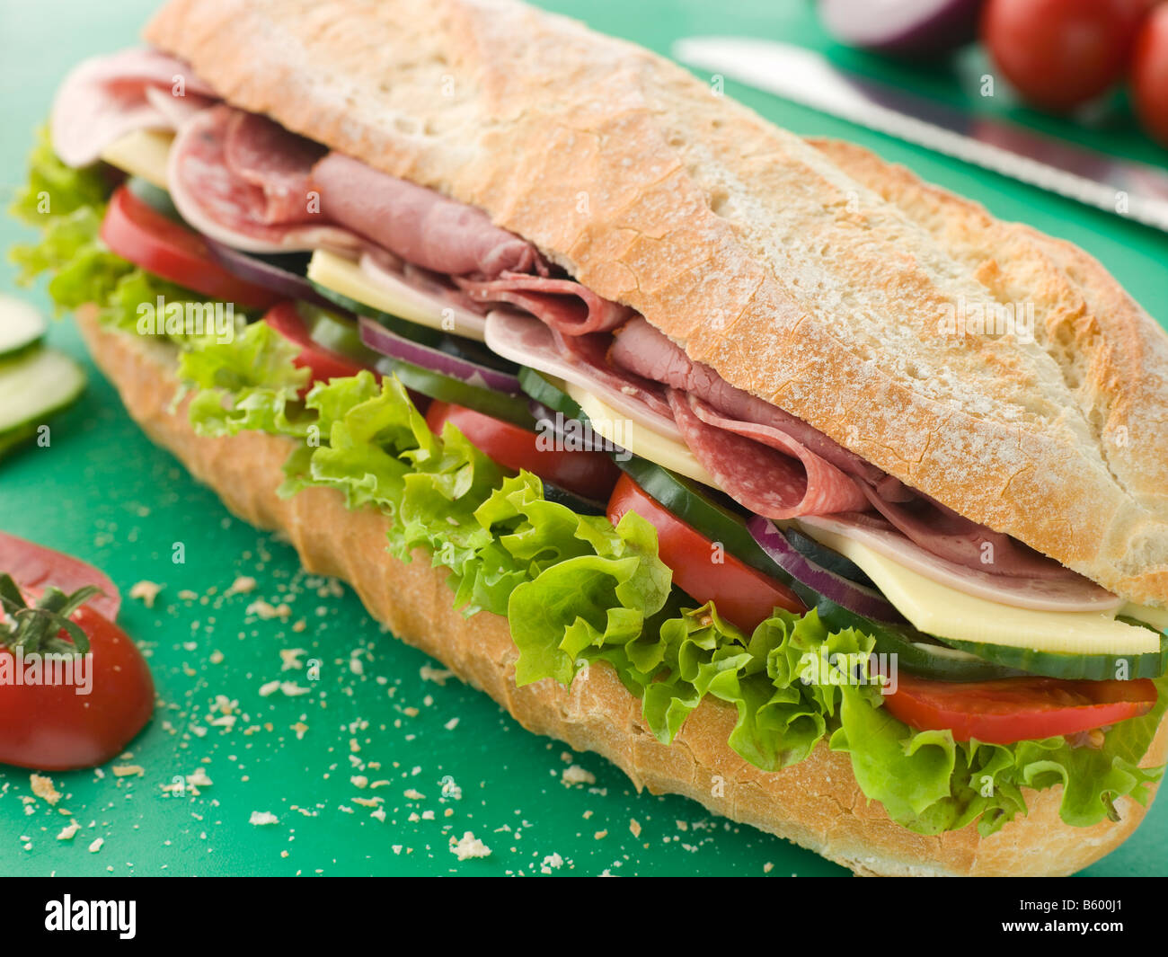 Deli Sub Sandwich on a Chopping Board Stock Photo Alamy