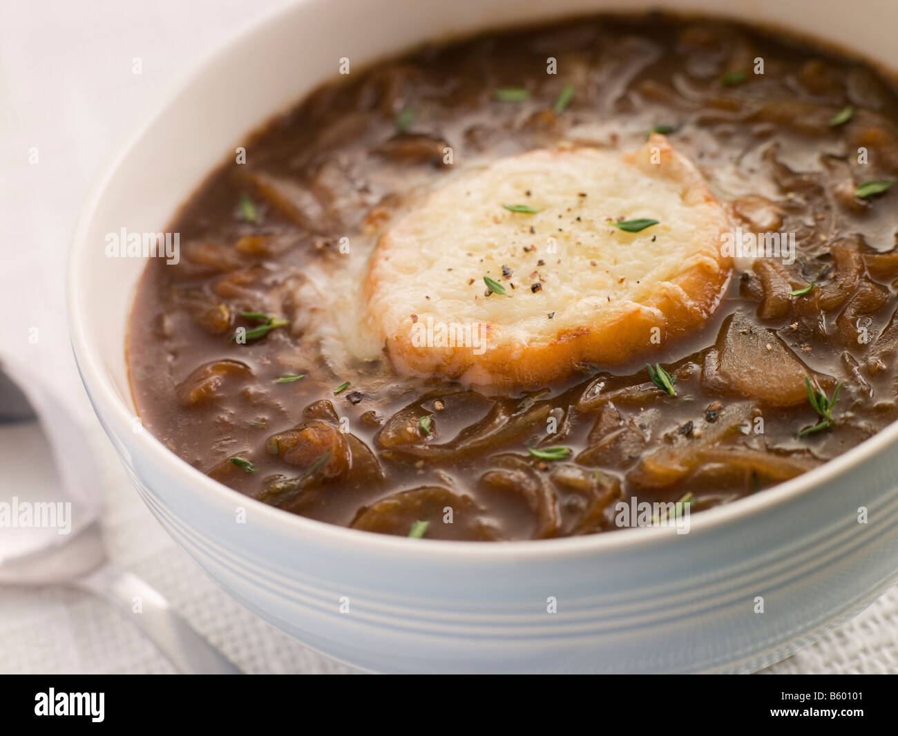 Bowl of French Onion Soup with a Goats Cheese Crouton Stock Photo