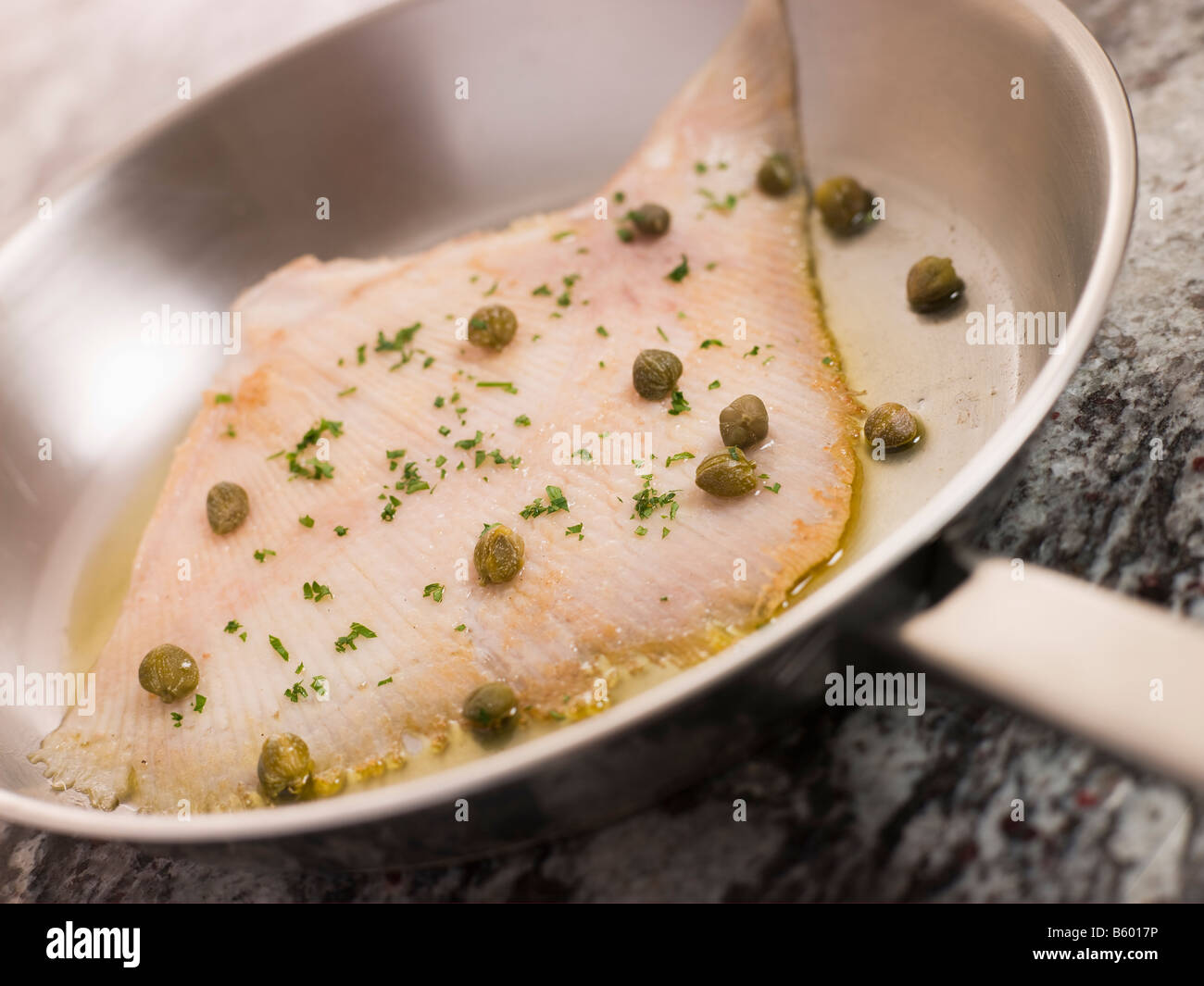 Pan Fried Wing of Skate with Caper Butter Stock Photo