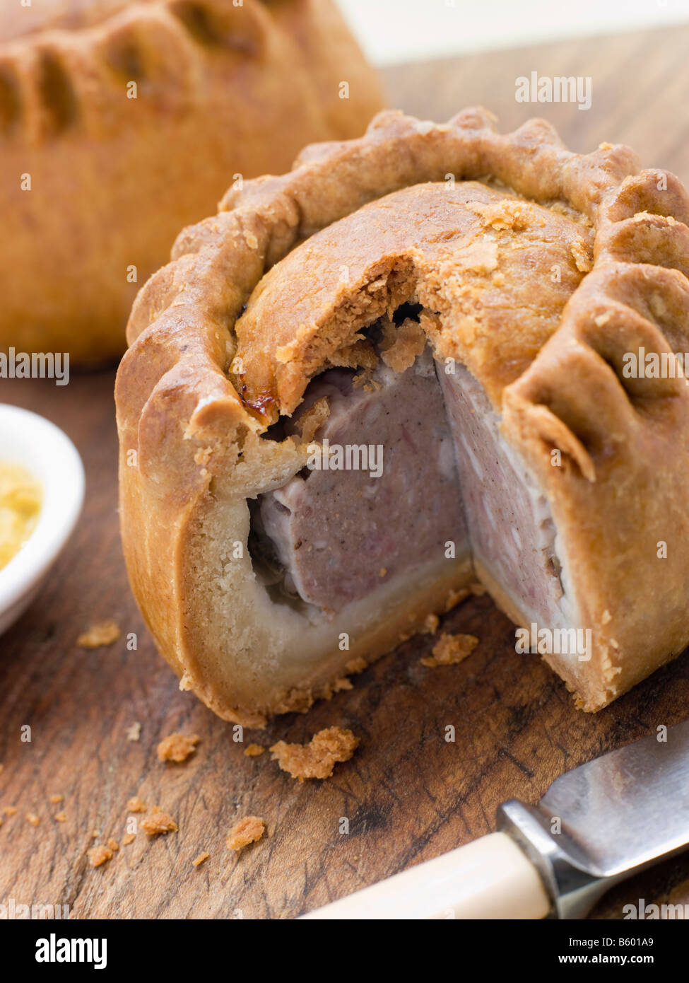Pork Pie with English Mustard Stock Photo Alamy
