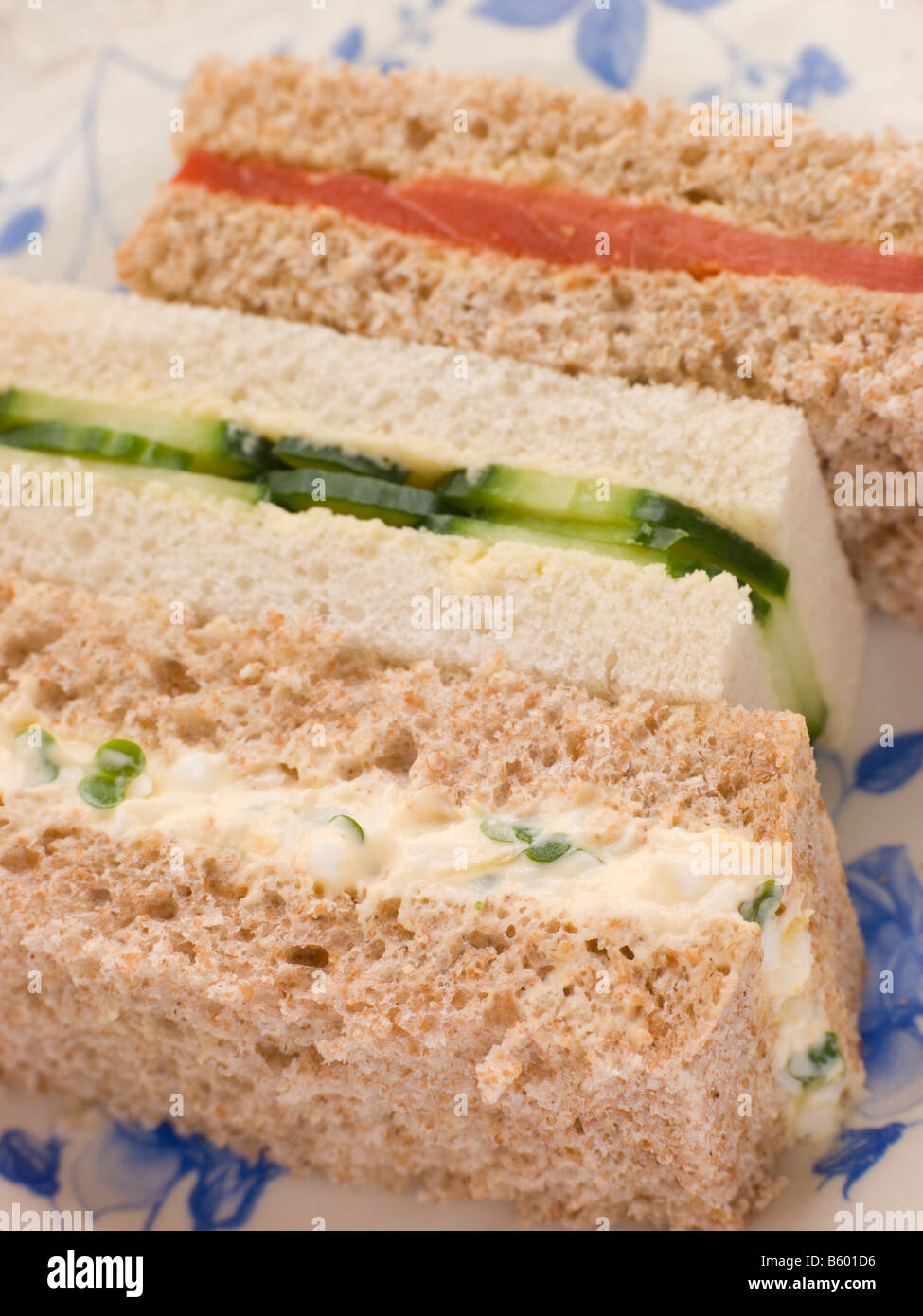 Afternoon Tea Finger Sandwiches- Egg and Cress Smoked Salmon and Cucumber Stock Photo