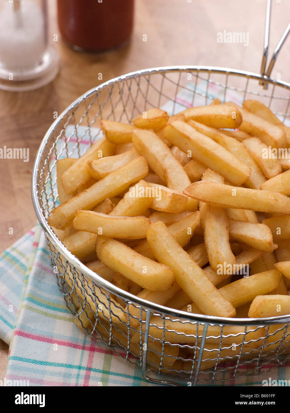 Chips in a Deep Frying Basket Stock Photo Alamy