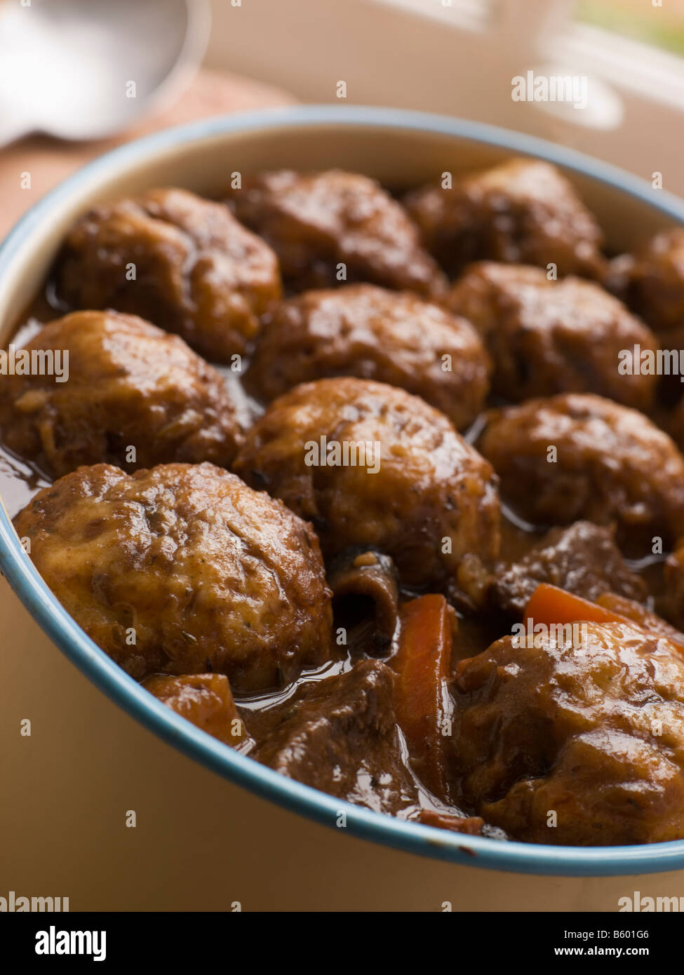 Beef Stew and Herb Dumplings Stock Photo