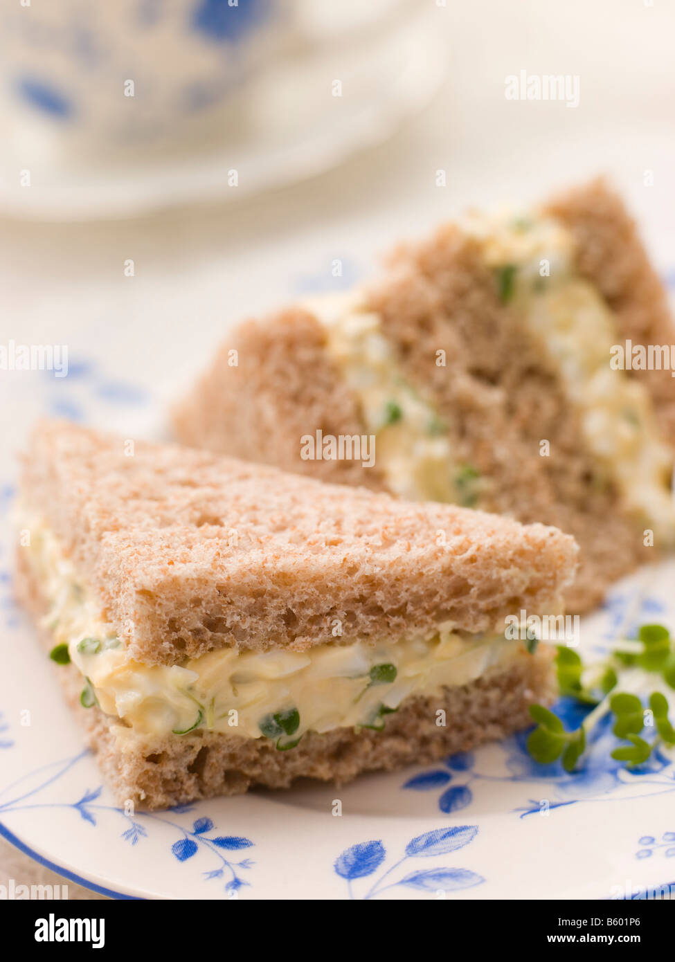 Egg and Cress Sandwich on Brown Bread with Afternoon Tea Stock Photo