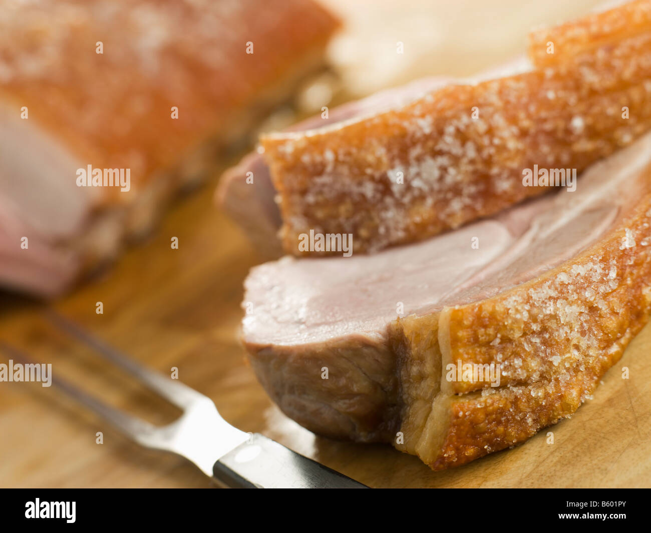 Roast Loin of Pork with Crispy Crackling Stock Photo Alamy