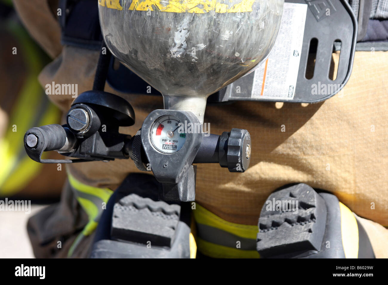 The oxygen air tank valve indicating the amount of air pressure still left in the tank for breathing by a firefighter Stock Photo