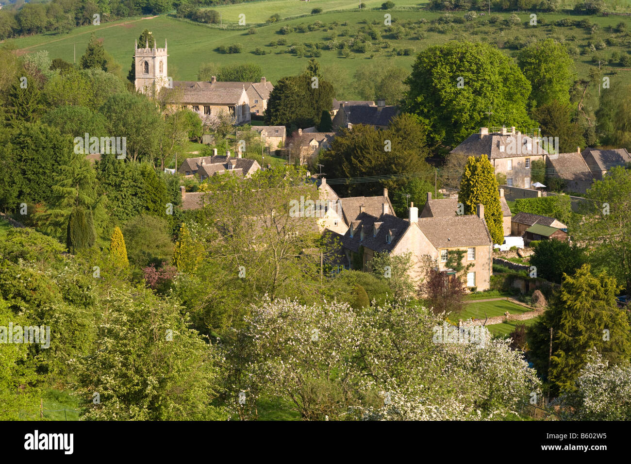 An early morning view of the Cotswold village of Naunton, in the valley of the infant River Windrush, Gloucestershire Stock Photo