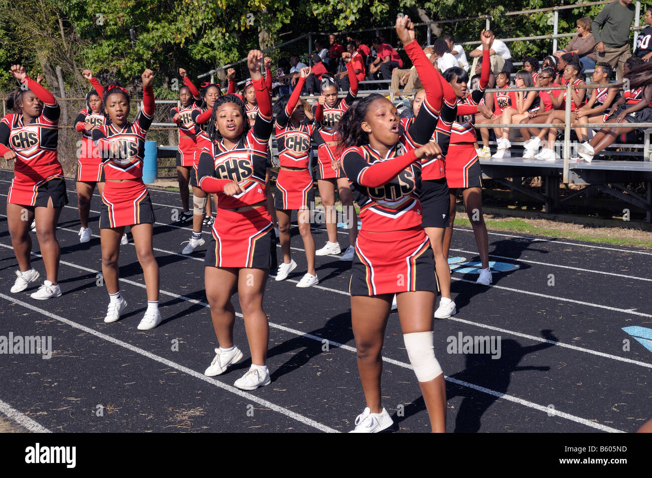 high school cheerleaders cheer their team in Seat Pleasant, Md Stock