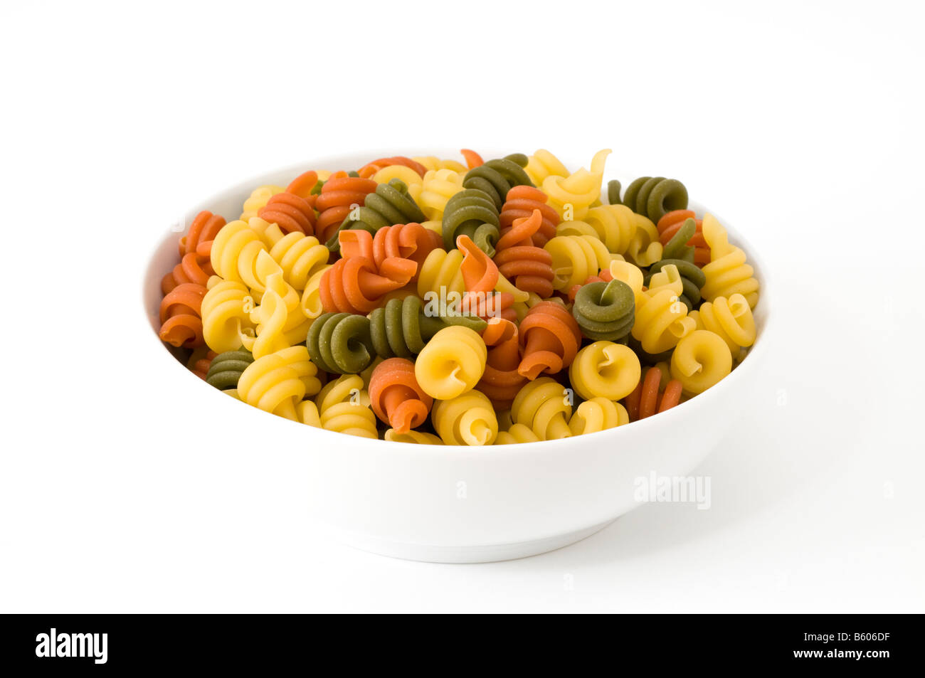 Colourful pasta in white bowl Stock Photo Alamy