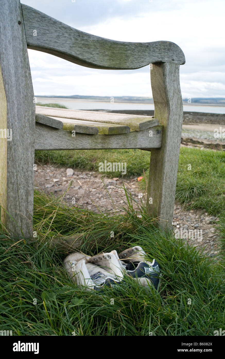 Lost pair of trainers on Lindisfarne, UK Stock Photo