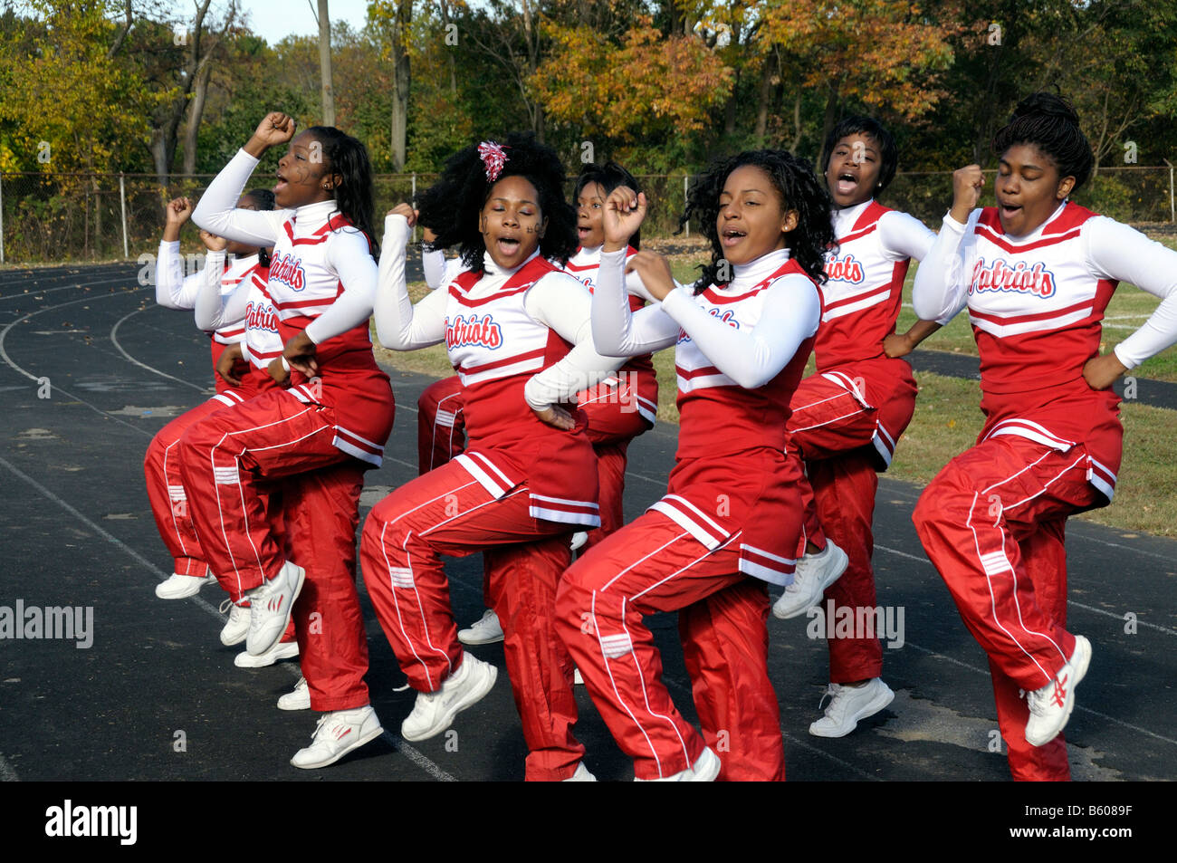 high school cheerleaders cheer their team in Seat Pleasant, Md Stock