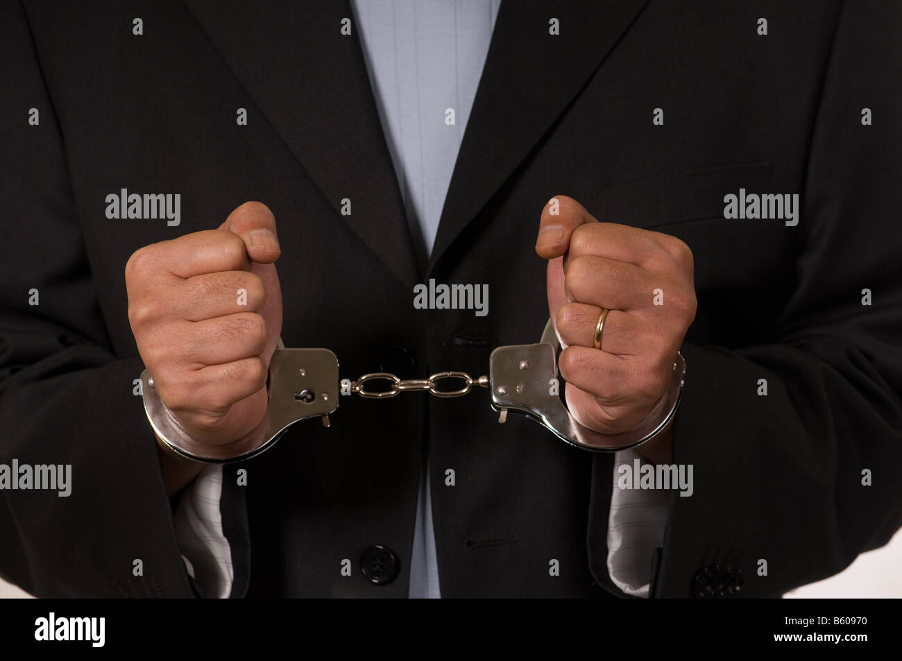 Man handcuffed arrested hi-res stock photography and images - Alamy