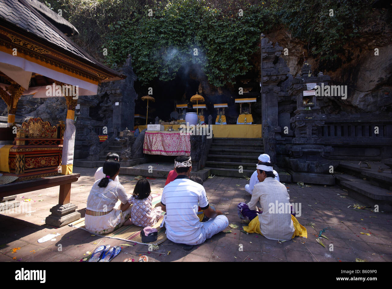 Worshippers at Goa Lawah (bat cave) temple at Wates village Bali Stock Photo