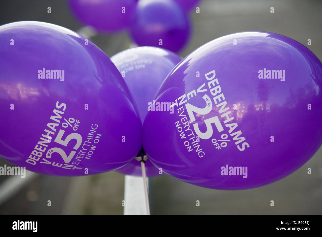 Balloons promote a shop sale event, Guildford, Surrey, England Stock