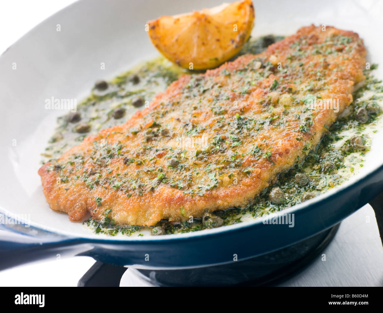 Cotoletta of Veal in a Frying Pan Stock Photo