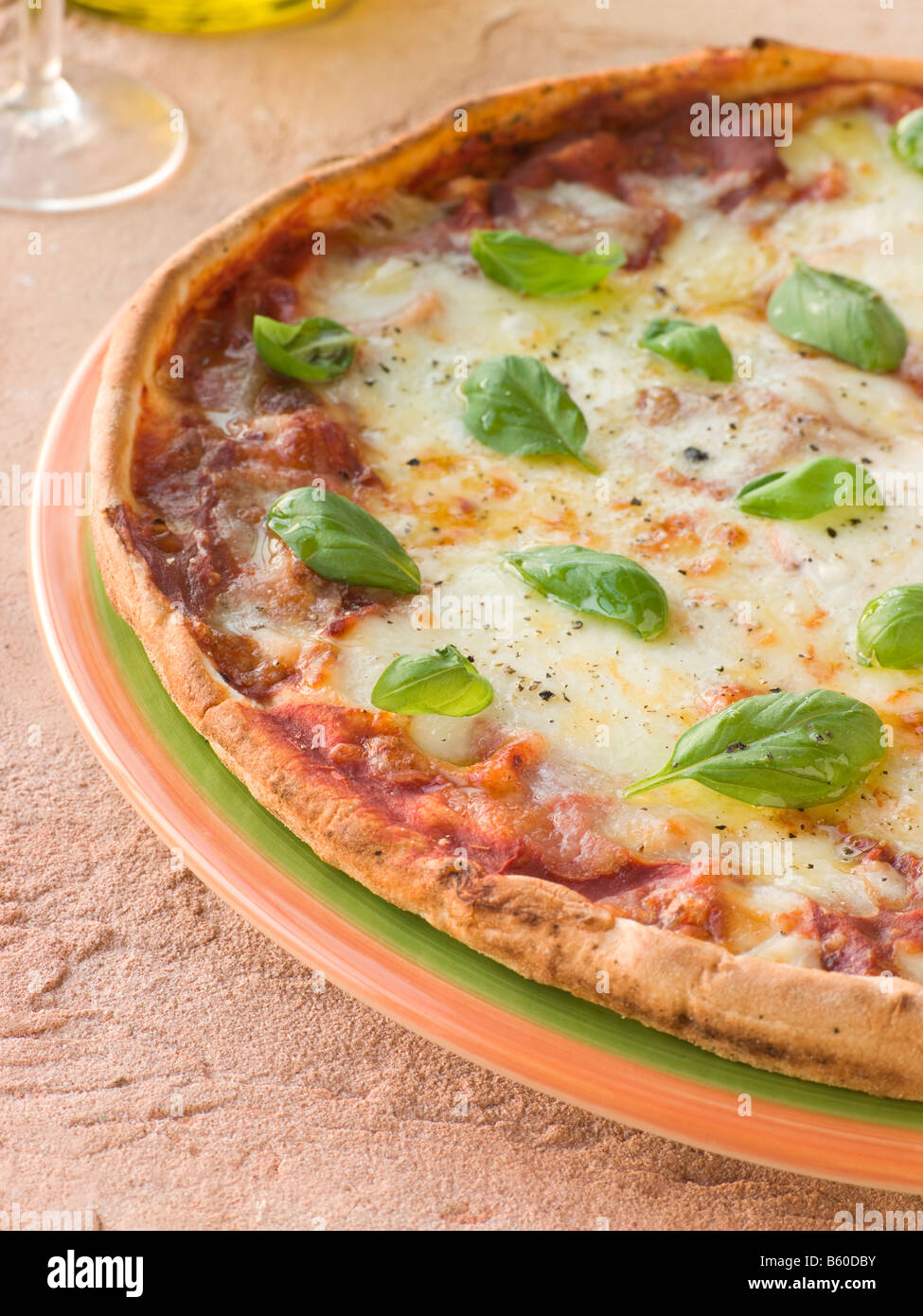 Margherita Pizza with Basil Leaves Stock Photo