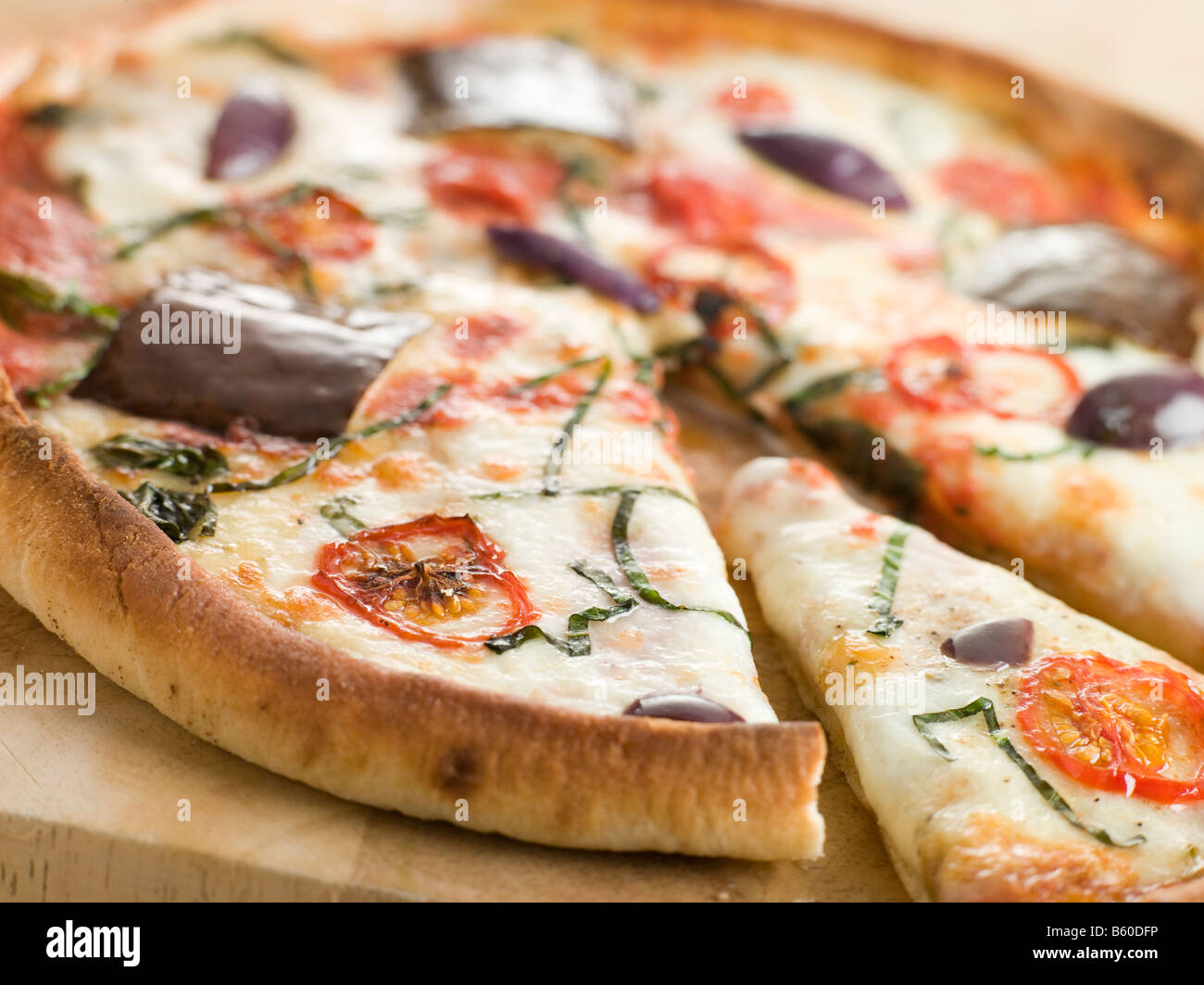 Tomato Mozzarella Aubergine and Basil Pizza Stock Photo Alamy